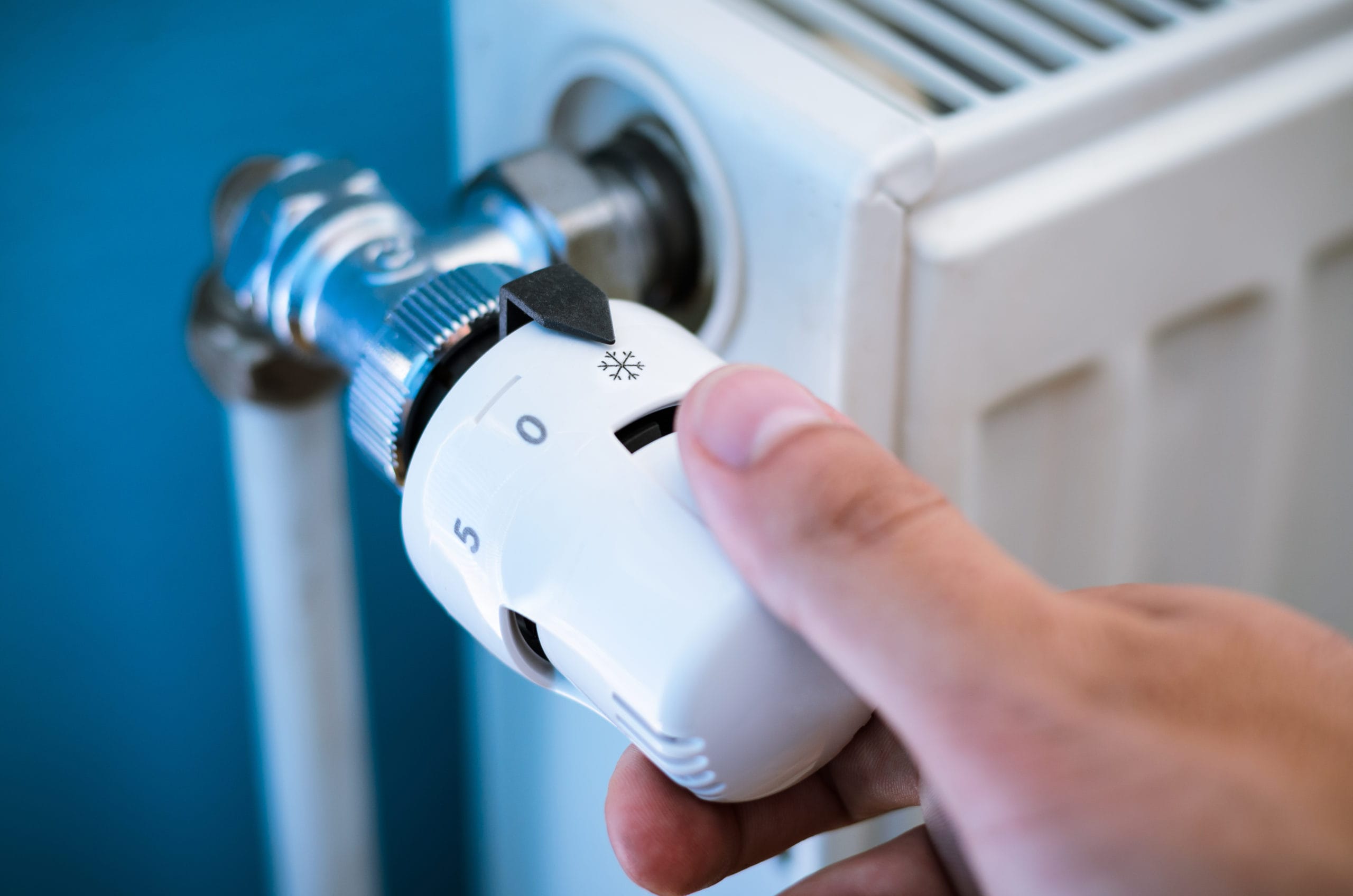 One hand adjust thermostat valve close up Spending quality time as a family!